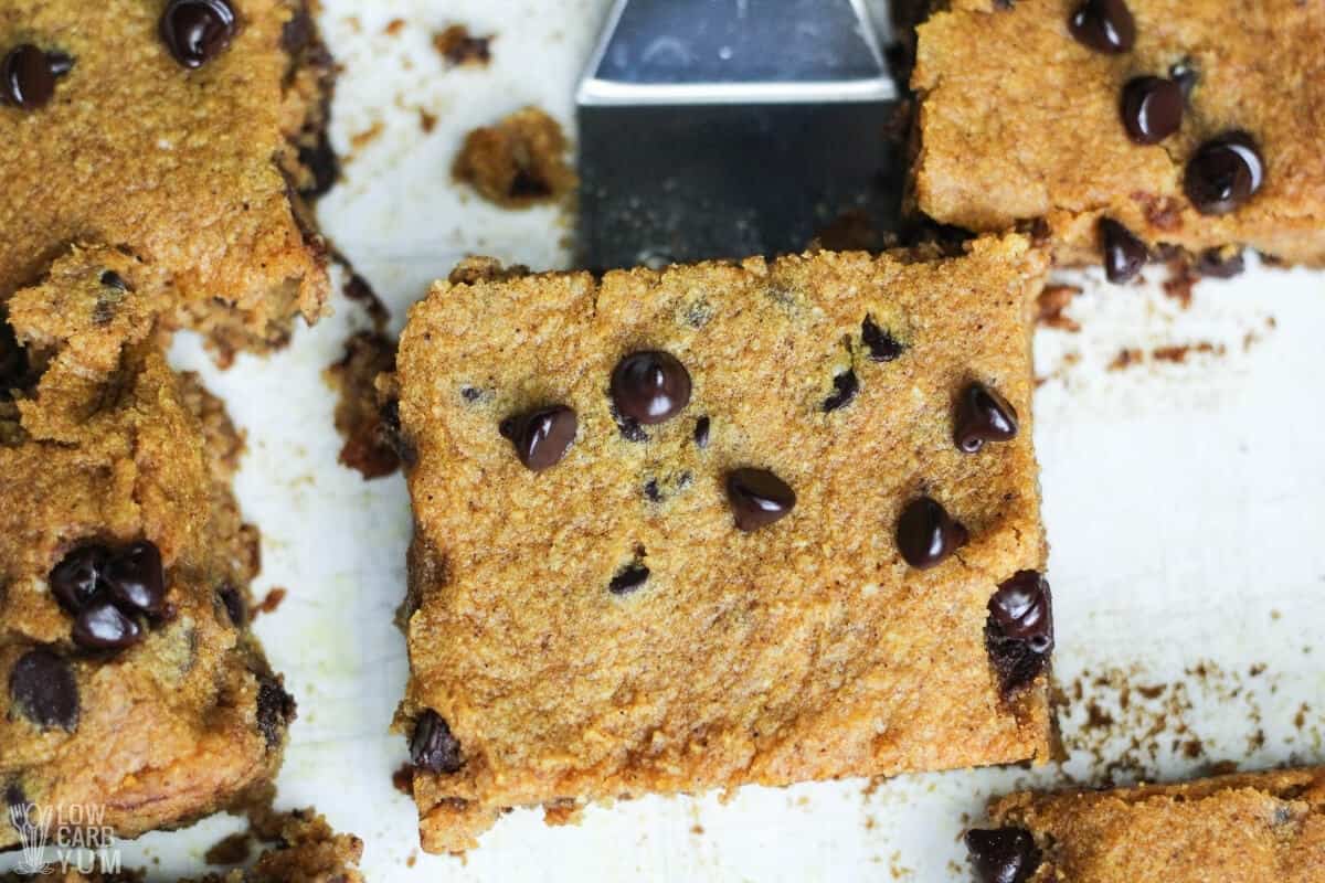 keto pumpkin bars with chocolate chips slice on spatula