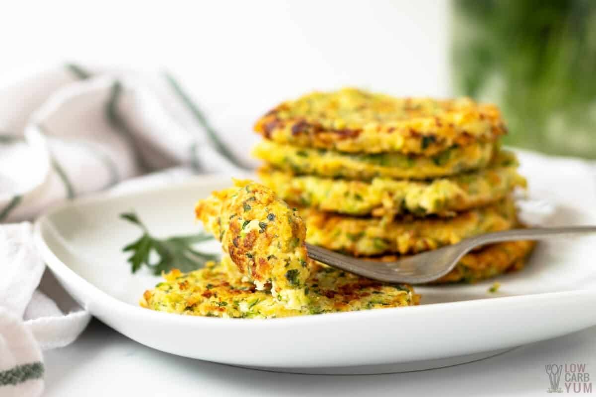 low carb zucchini fritters on white plate