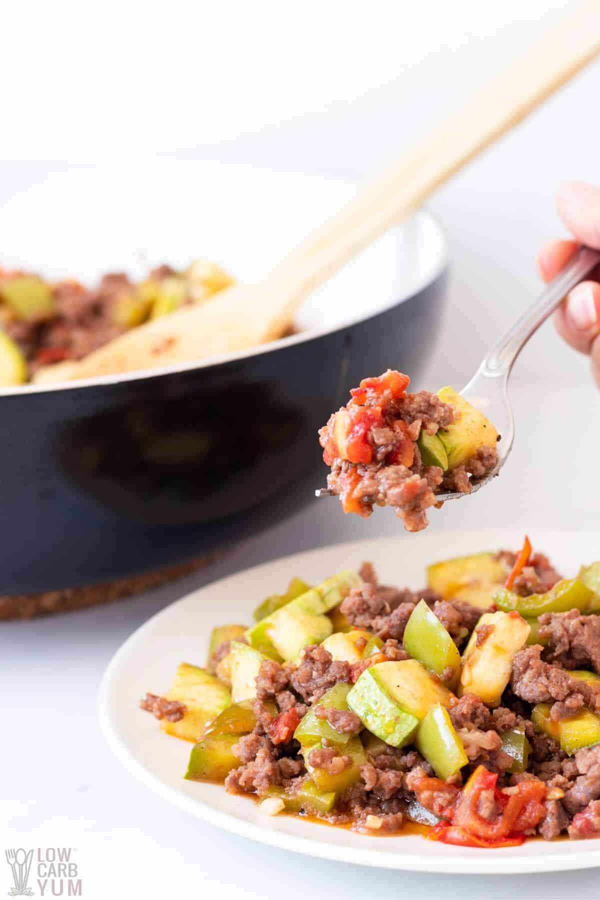 skillet squash ground beef on fork over plate