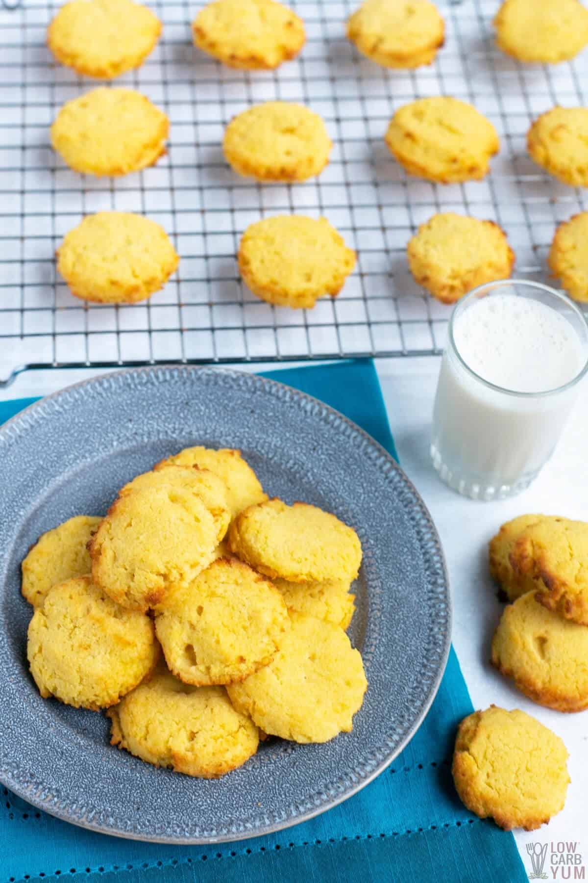 coconut flour cookies on plate and rack with milk