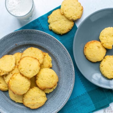 coconut flour cookies on plates with glass of milk