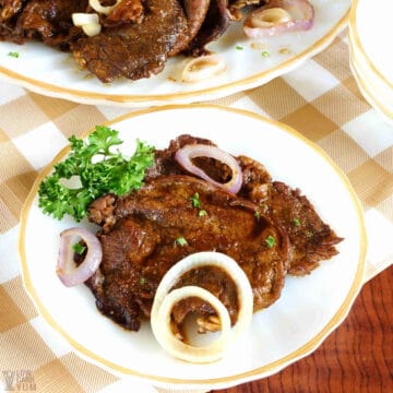 filipino beef steak bistek recipe on plates