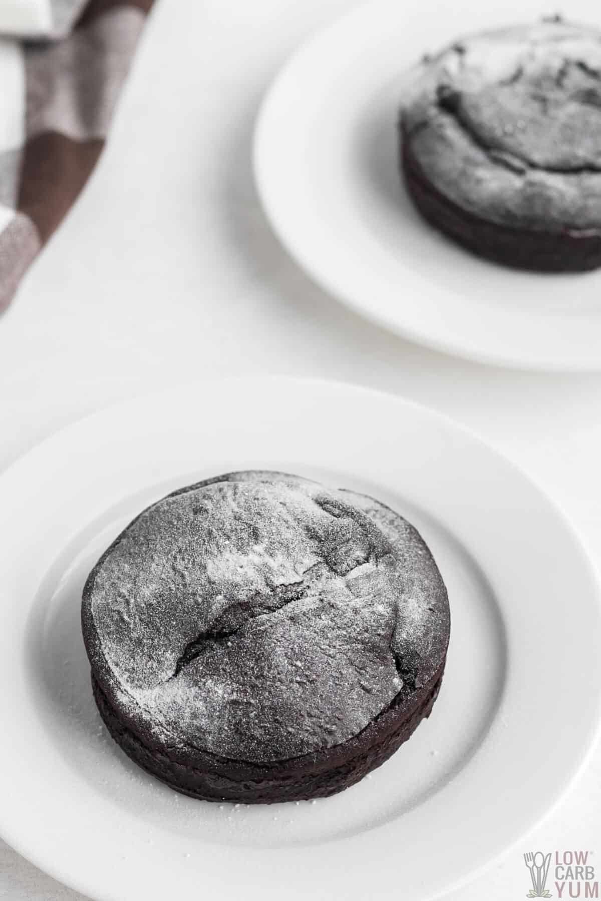 keto chocolate lava cakes dusted with powdered sweetener