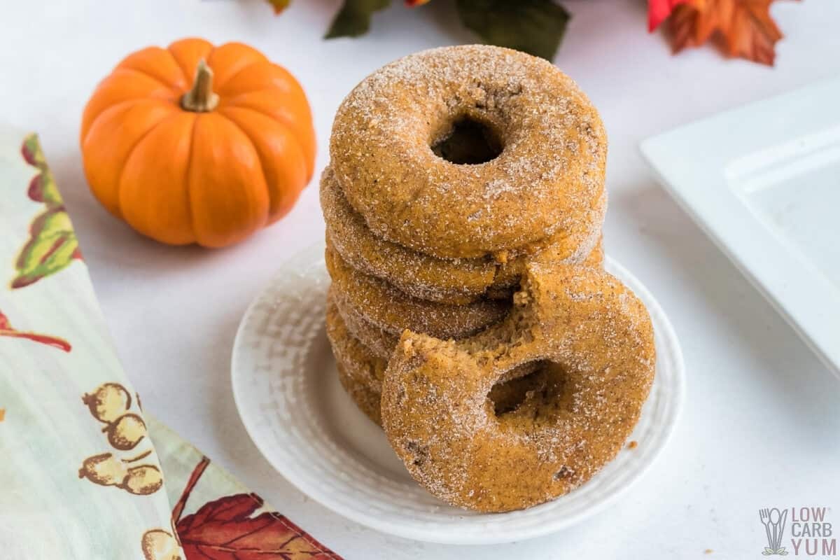 stack of keto pumpkin donuts on white plate