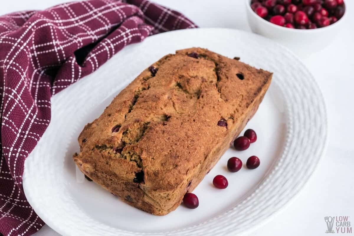 loaf of keto cranberry bread on platter