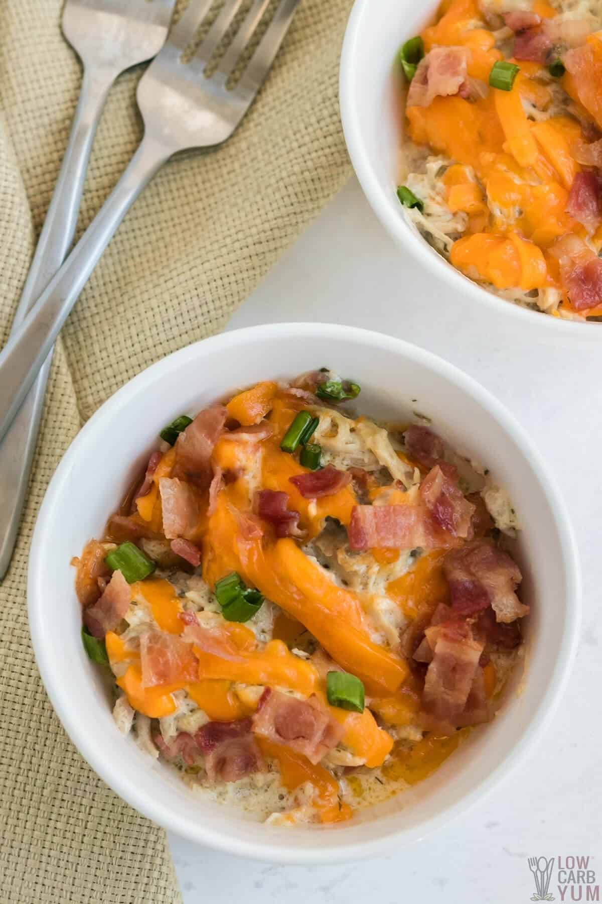 crockpot crack chicken in white serving bowls