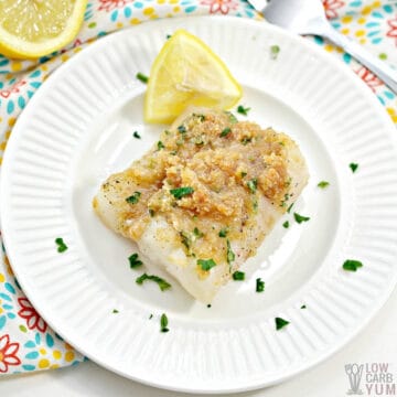 keto baked cod on white plate