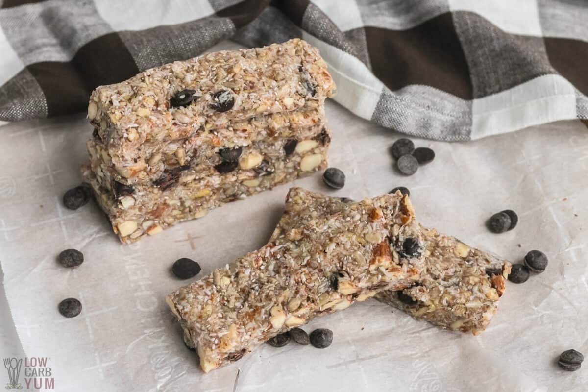 keto granola bars stacked on parchment paper