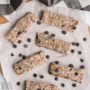 overhead shot of keto granola bars on parchment paper