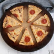 slices of pizza with keto coconut flour pizza crust
