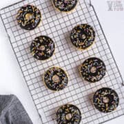 overhead of glazed donuts on cooling rack