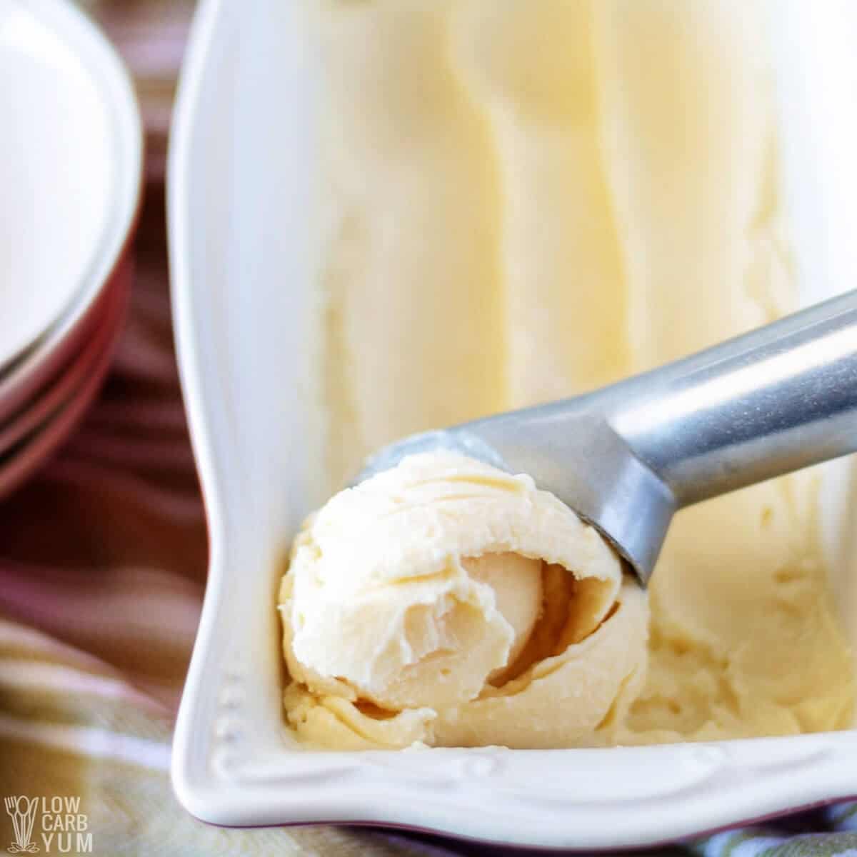 scooping vanilla ice cream