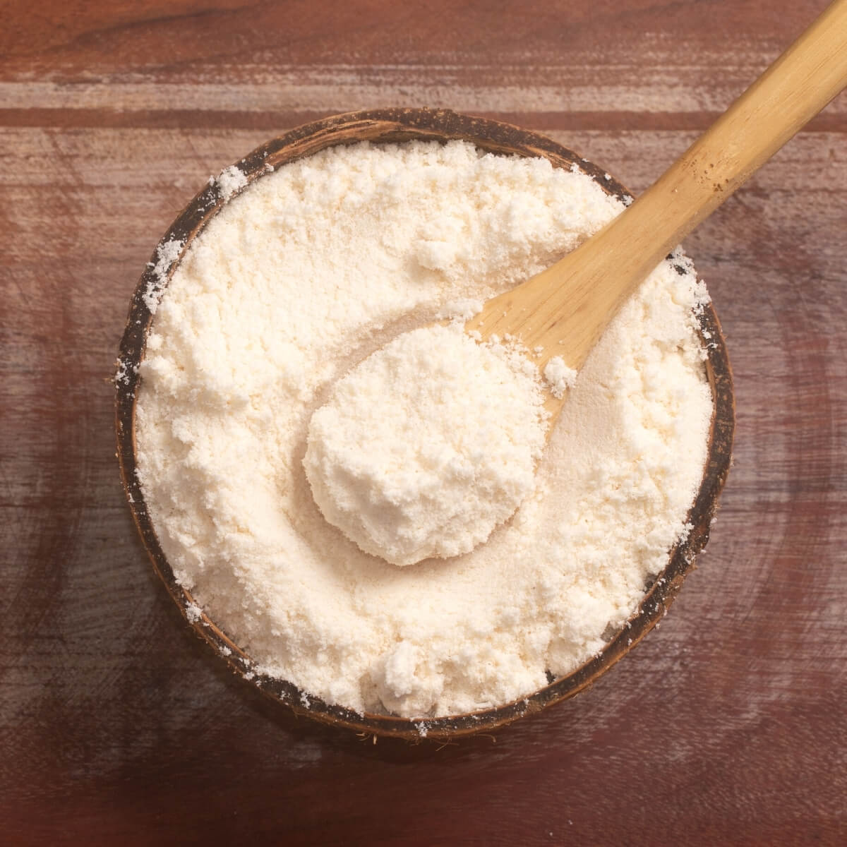 low carb coconut flour in bowl with spoon