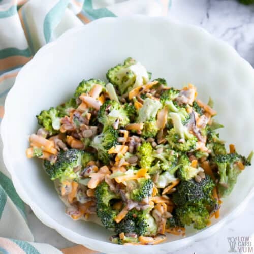 keto broccoli salad with bacon and cheese in white bowl