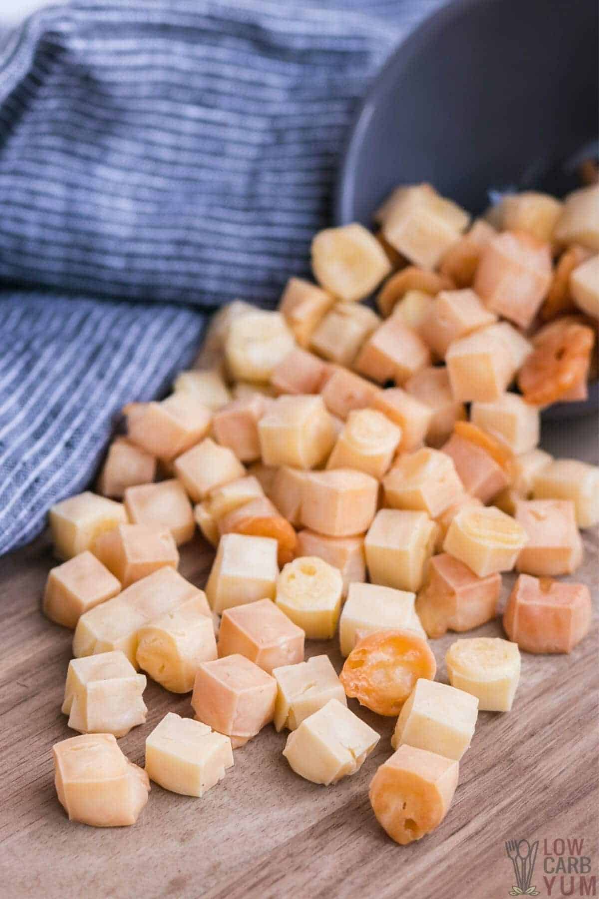 keto popcorn is poured out of bowl on cutting board