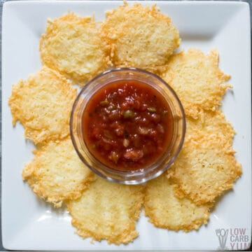 parmesan cheese crisps on plate with salsa