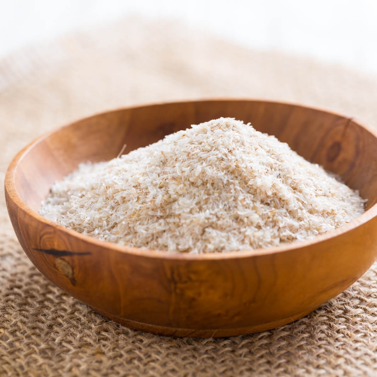 psyllium husks in wood bowl