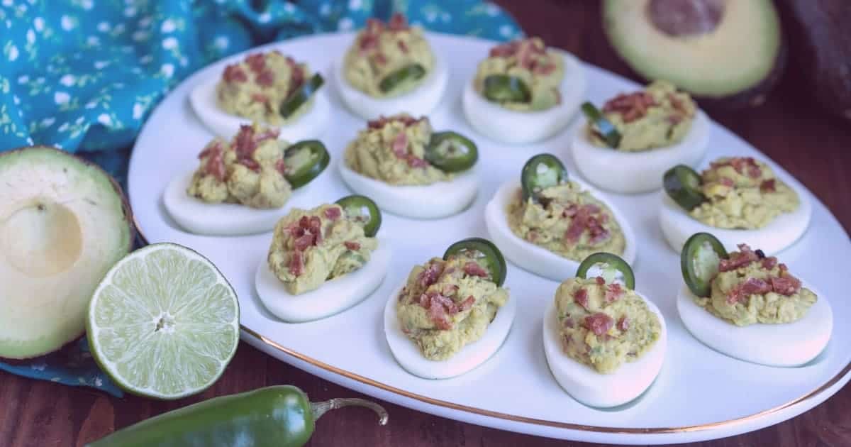 spicy deviled eggs without mayo on white plate