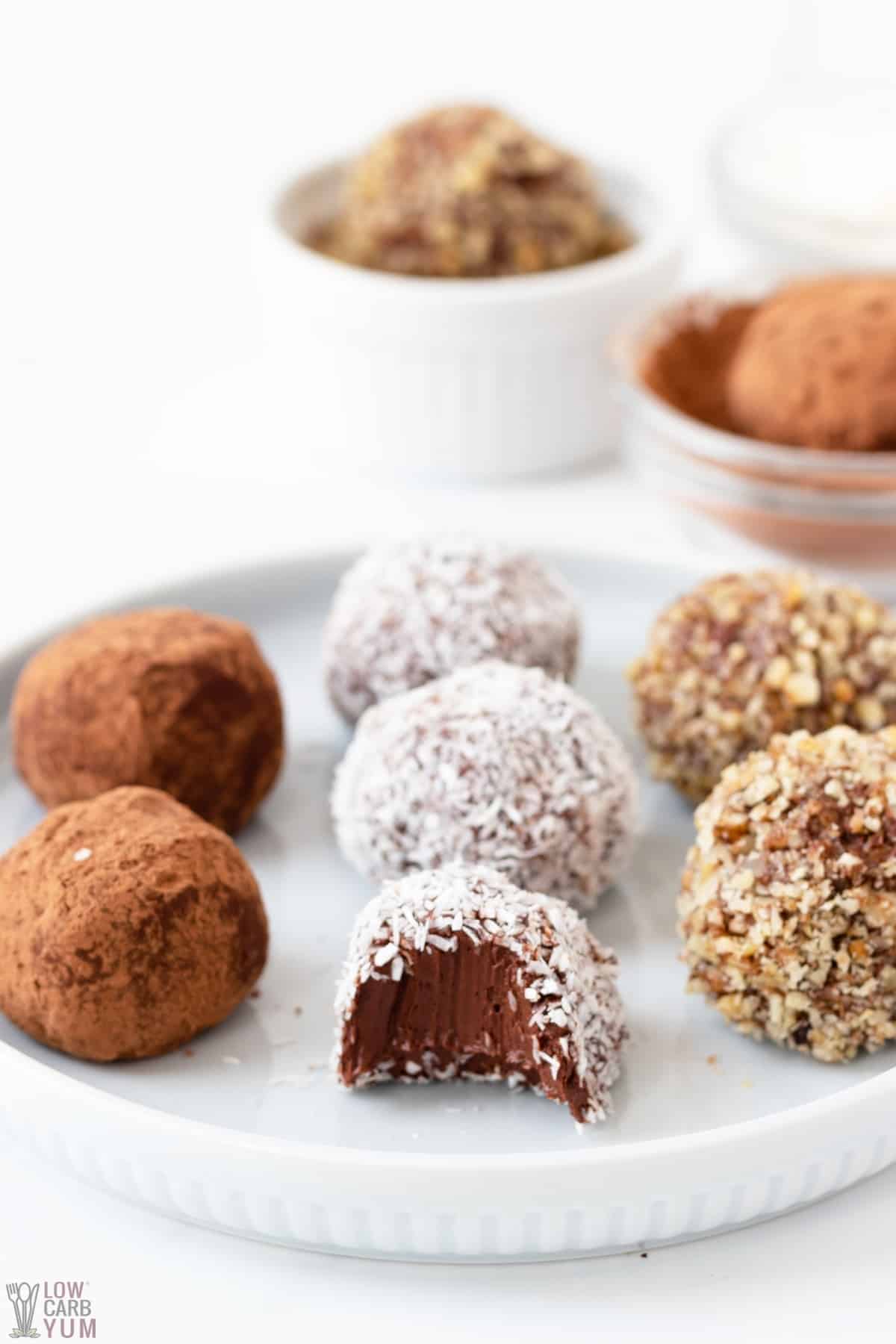 chocolate truffles on a plate with assorted coatings