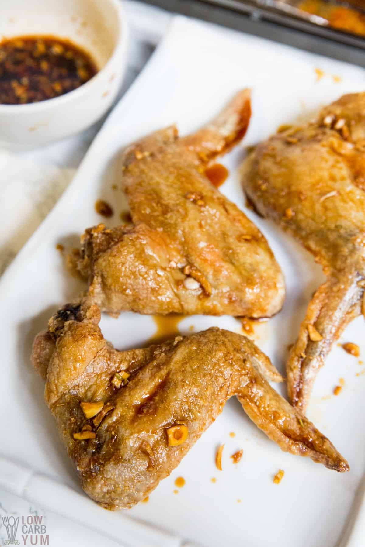 baked teriyaki chicken wings on serving plate