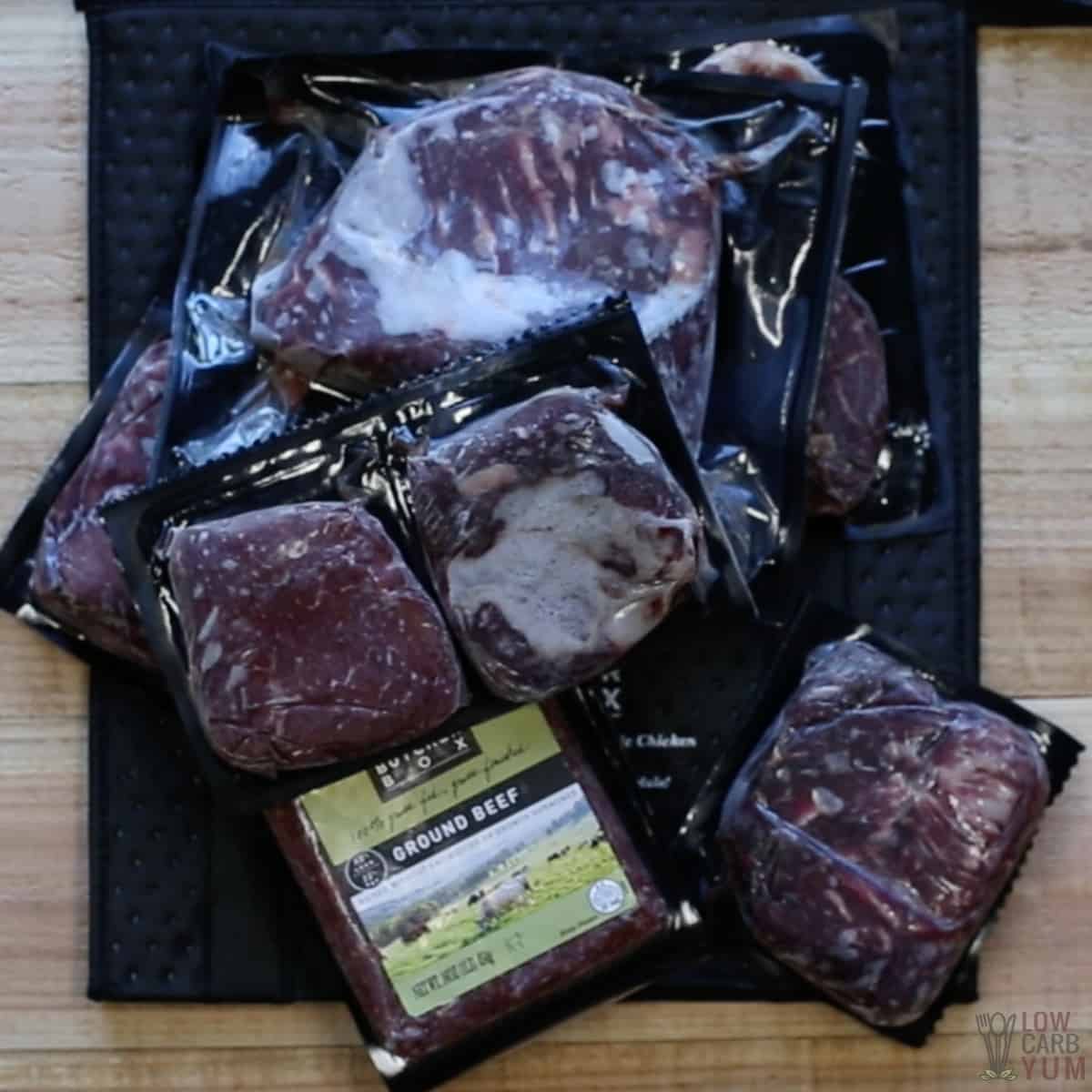 butcher box meats over black cooler bag