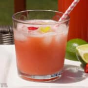limeade fruit juice in glass with straw