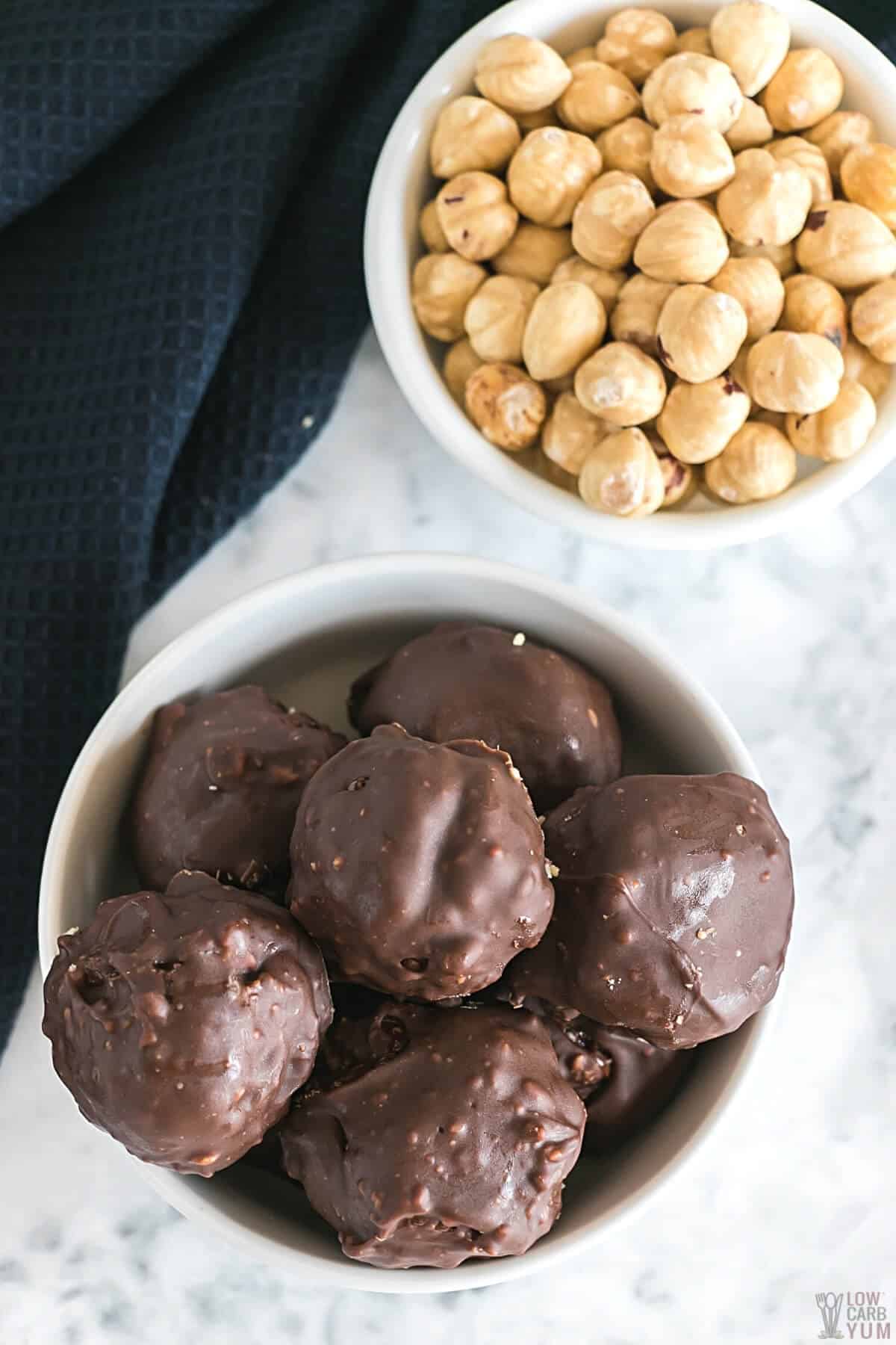 chocolate hazelnut candy in bowl with nut bowl