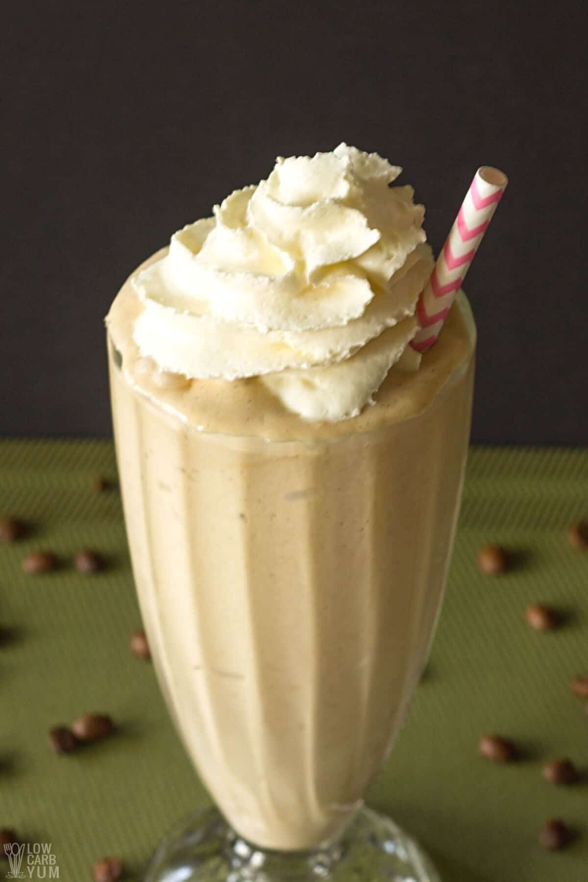 keto coffee shake in tall glass with whipped cream