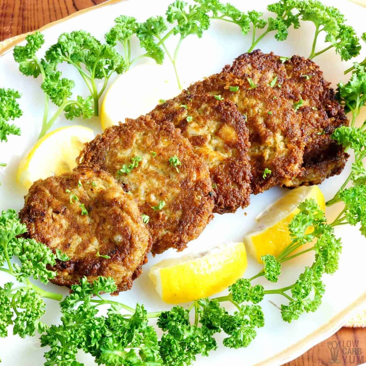 keto crab cakes on platter with parsley