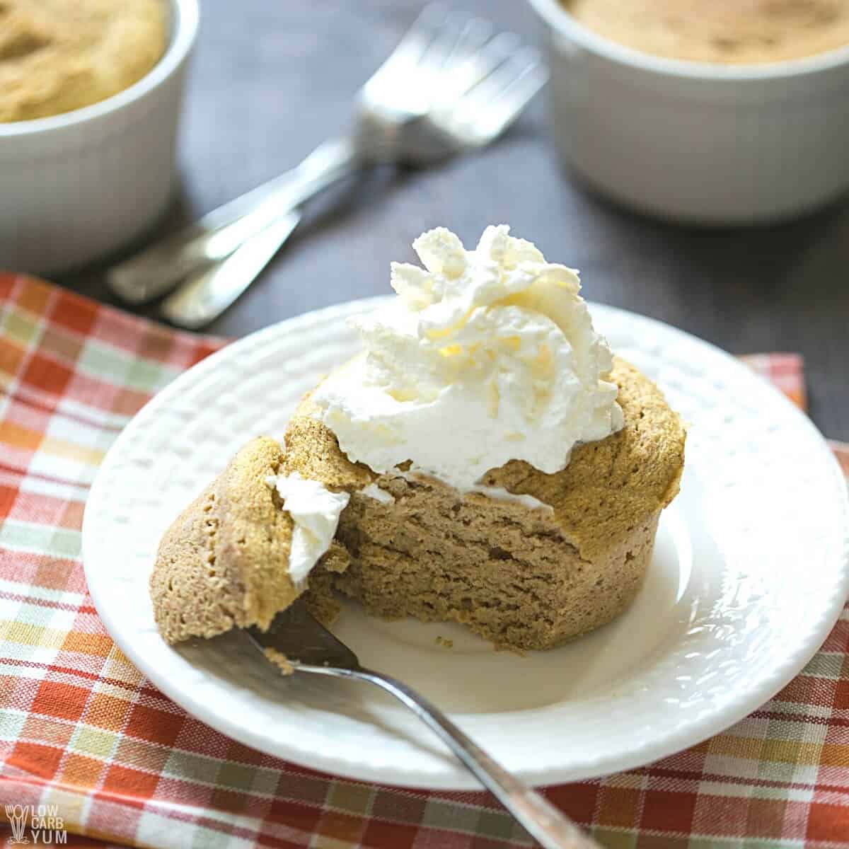 pumpkin mug cake on with plate cut with fork