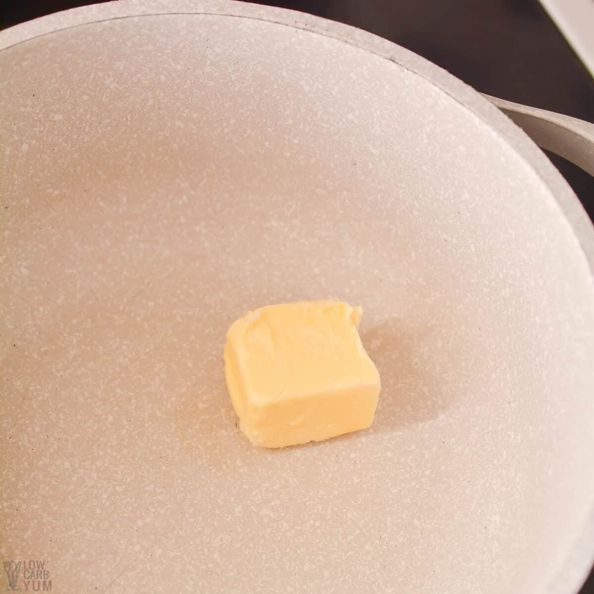 unsalted butter in skillet
