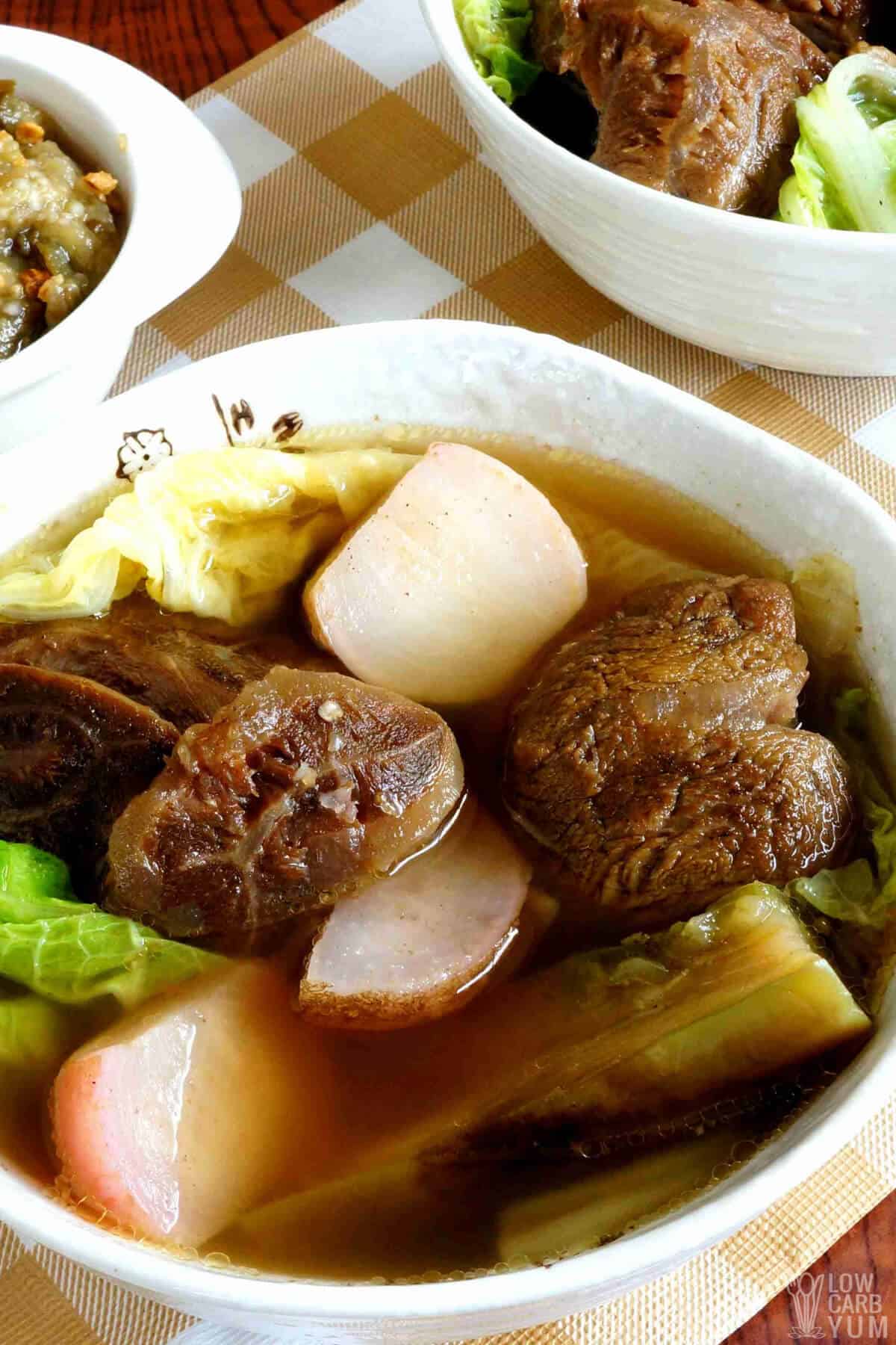 vegetable beef soup closeup in bowl