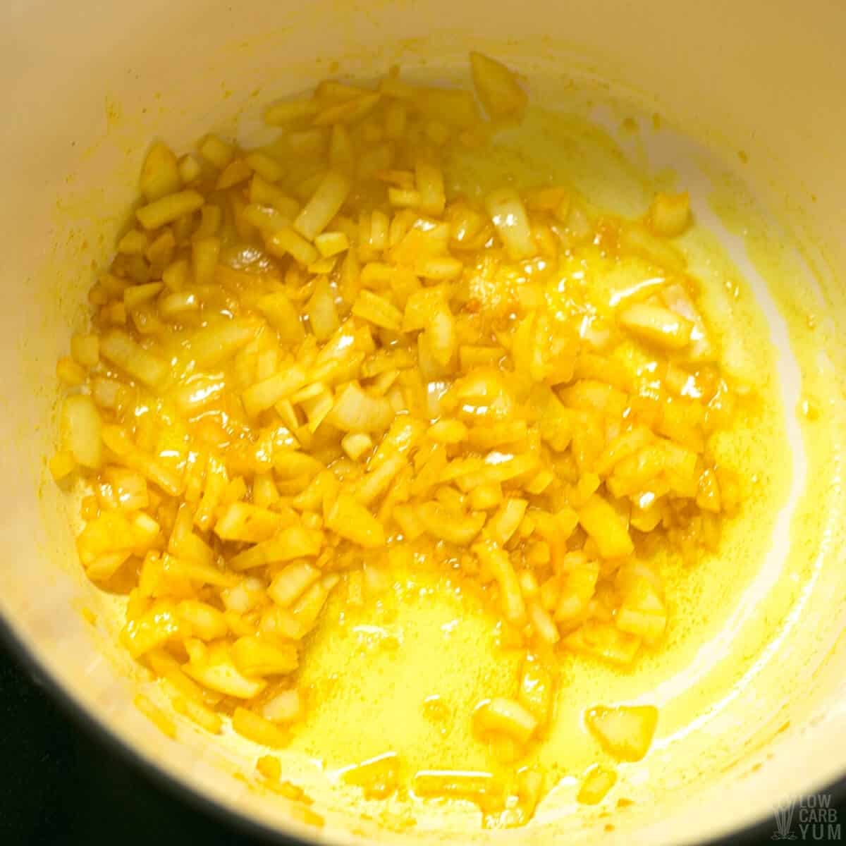 cooked garlic and onion with turmeric
