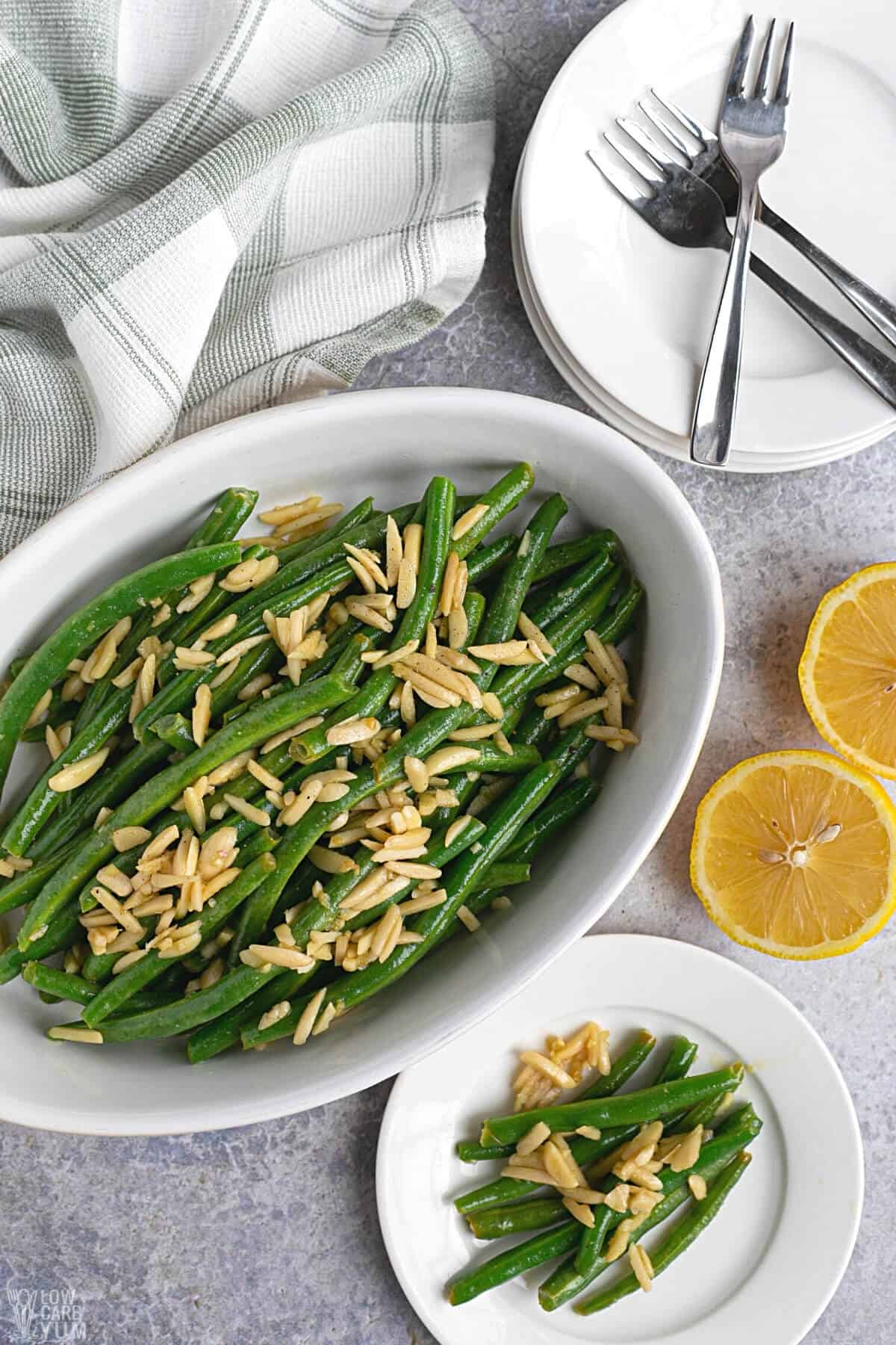 green beans almondine recipe served on white plate