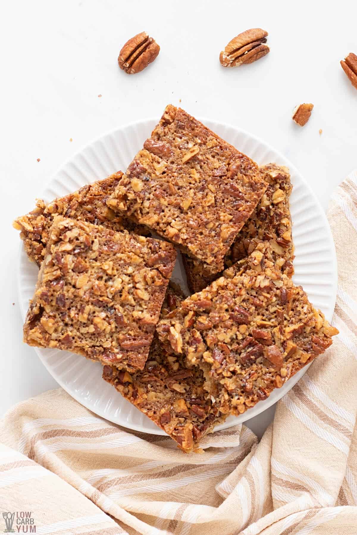 overhead of sliced pecan bars for best nuts for keto baking