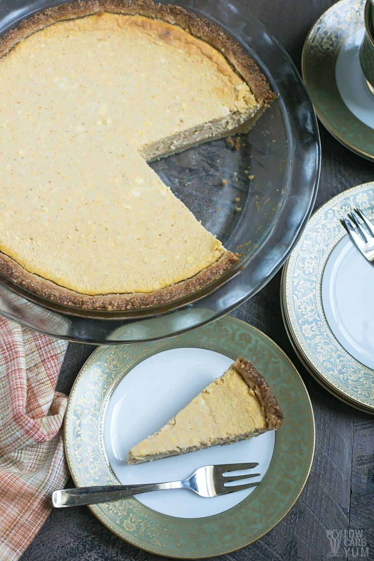 overhead of pumpkin cheesecake pie and slice