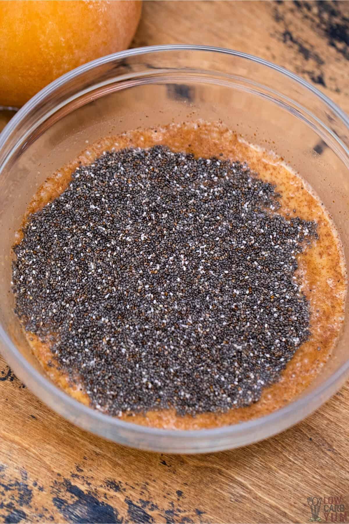 adding the chia seeds to mixture in bowl