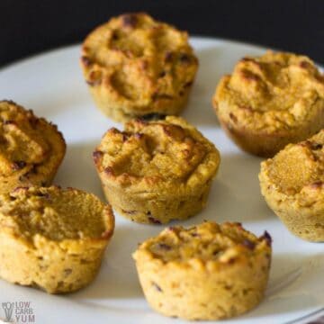 cranberry pumpkin muffins on white plate