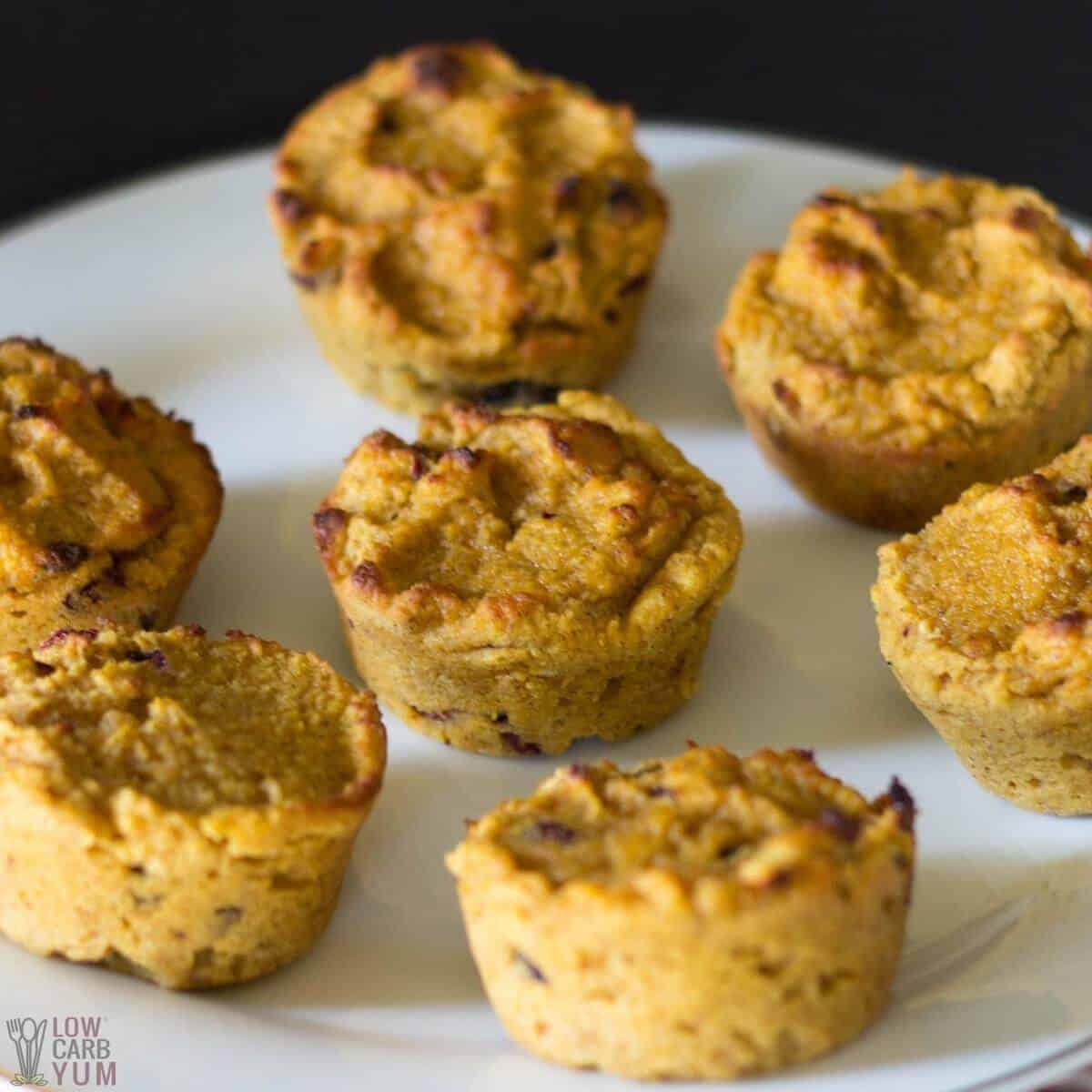 cranberry pumpkin muffins on white plate