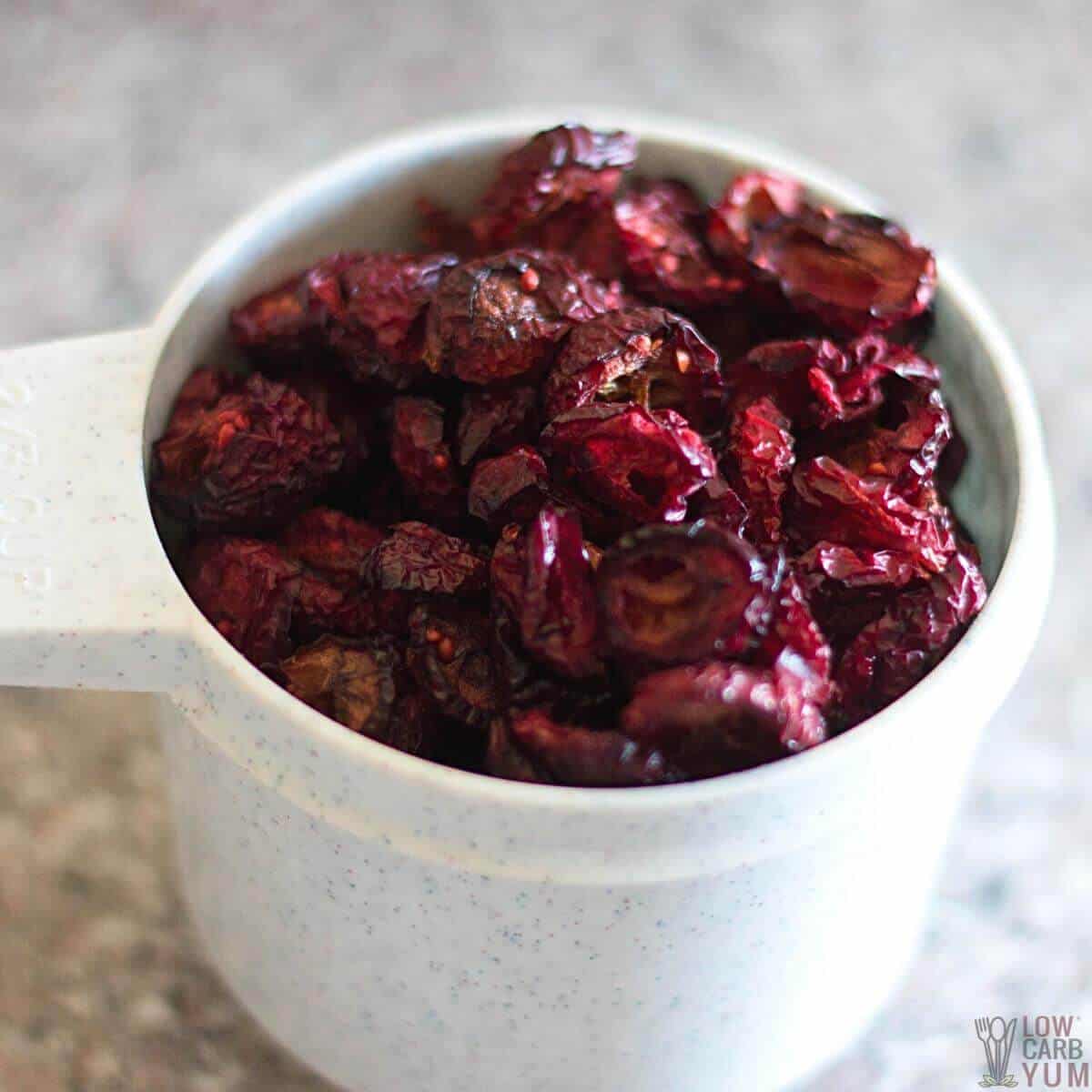 keto dried cranberries in measure cup