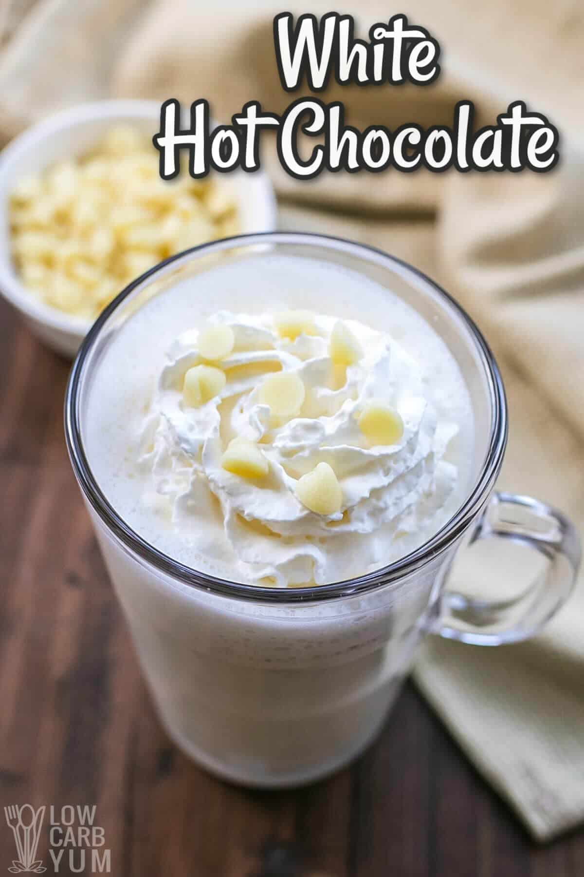 white hot chocolate in tall glass mug