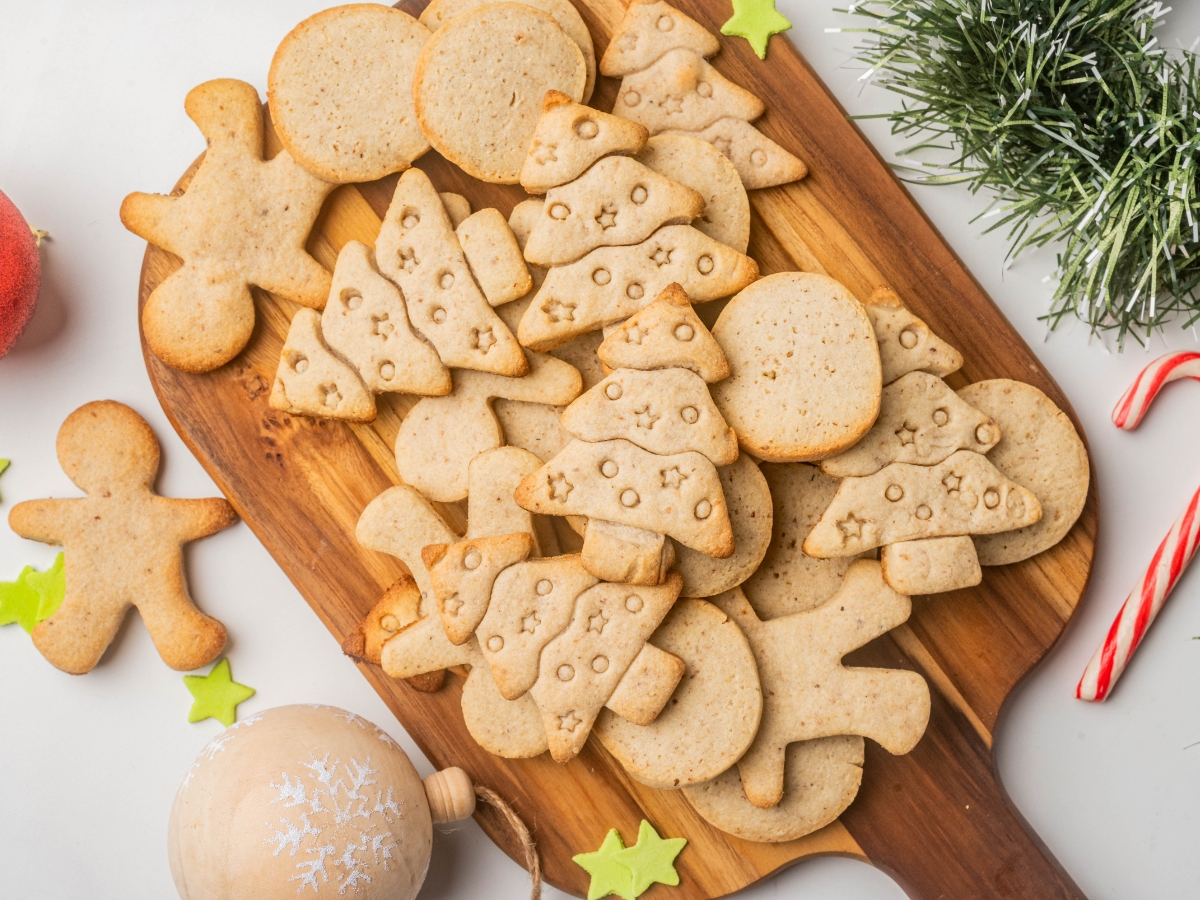 homemade keto christmas cookies on a wooden board 