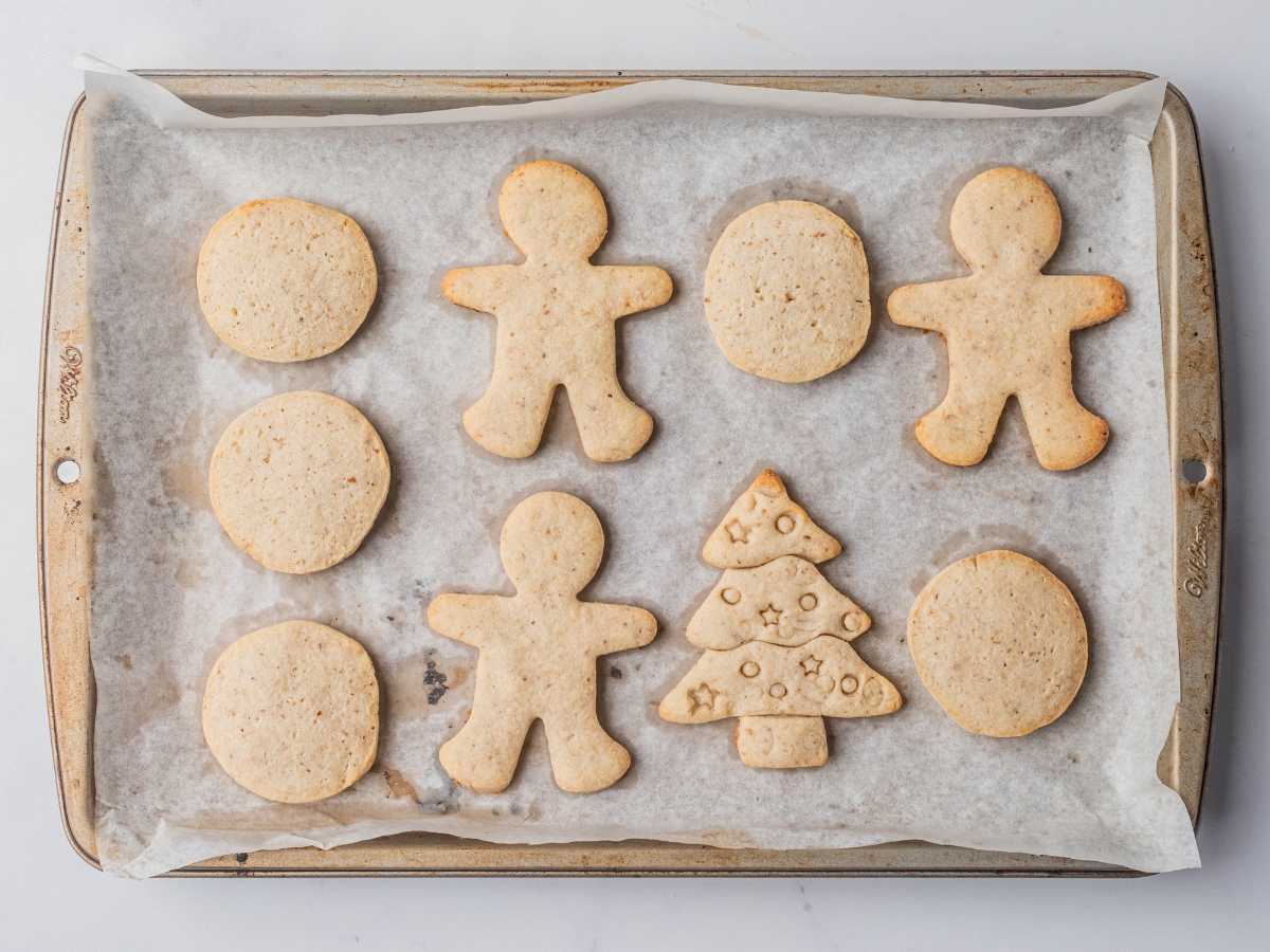 baked cream cheese cookies on a baking sheet 