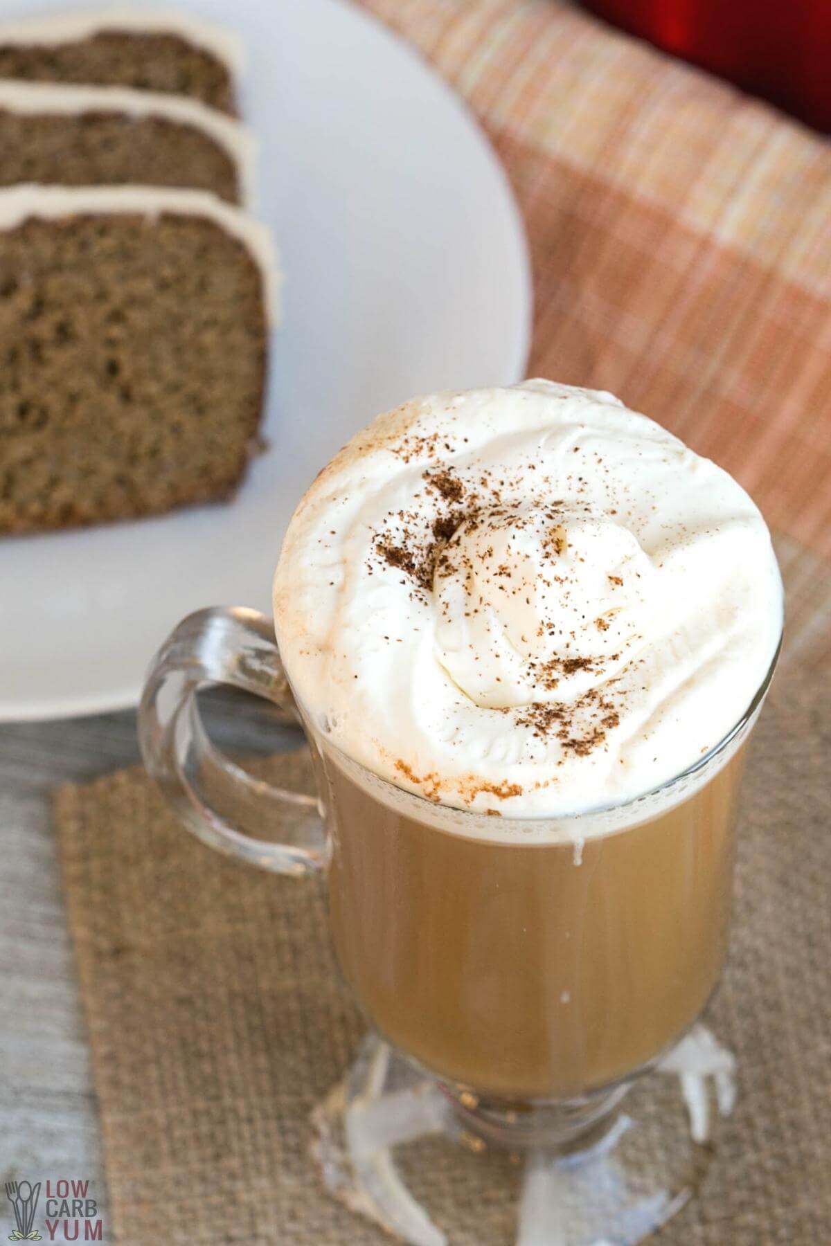 spices sprinkled on top of whipped cream topped coffee