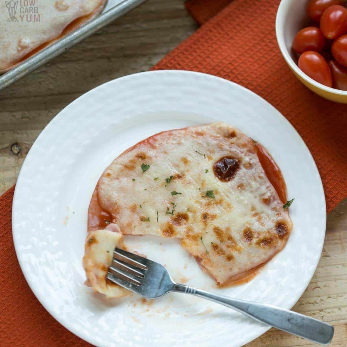 crustless pizza on plate with fork bite