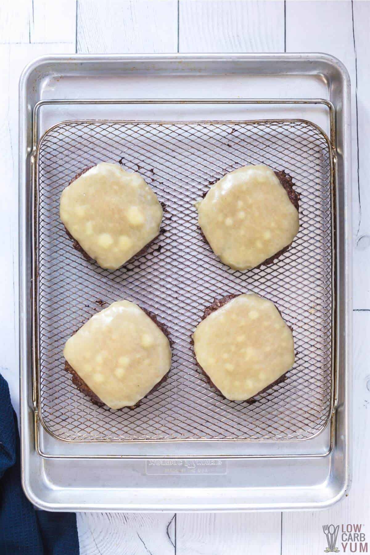 air fryer hamburgers with melted cheese on top