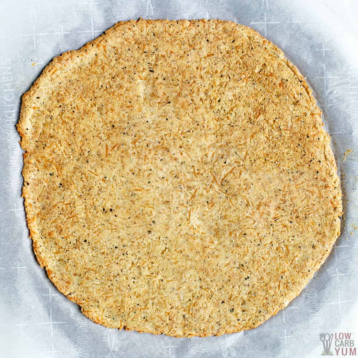 almond flour crust on parchment paper