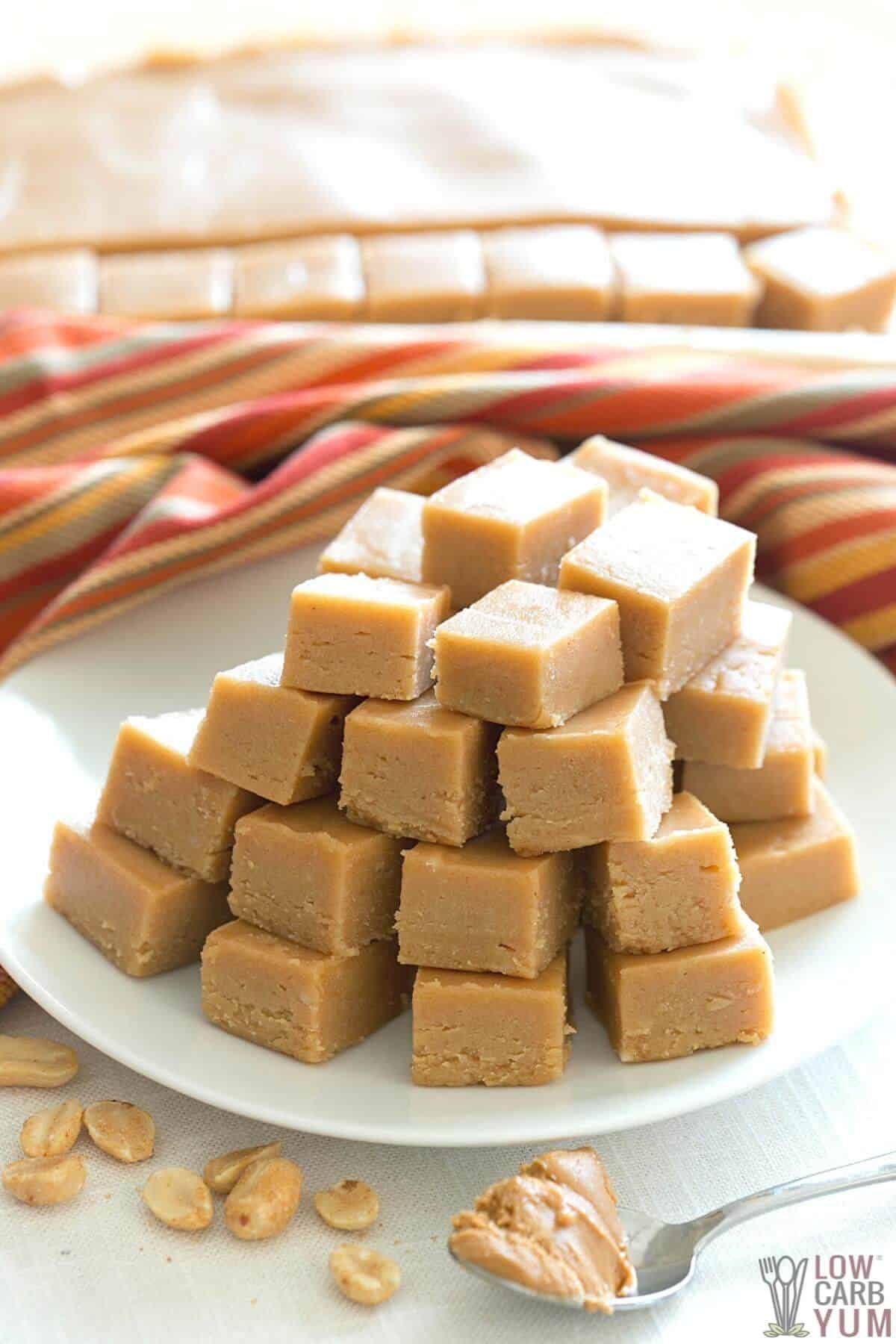 keto cream cheese peanut butter fudge squares on white plate