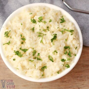 mashed cauliflower in white serving bowl