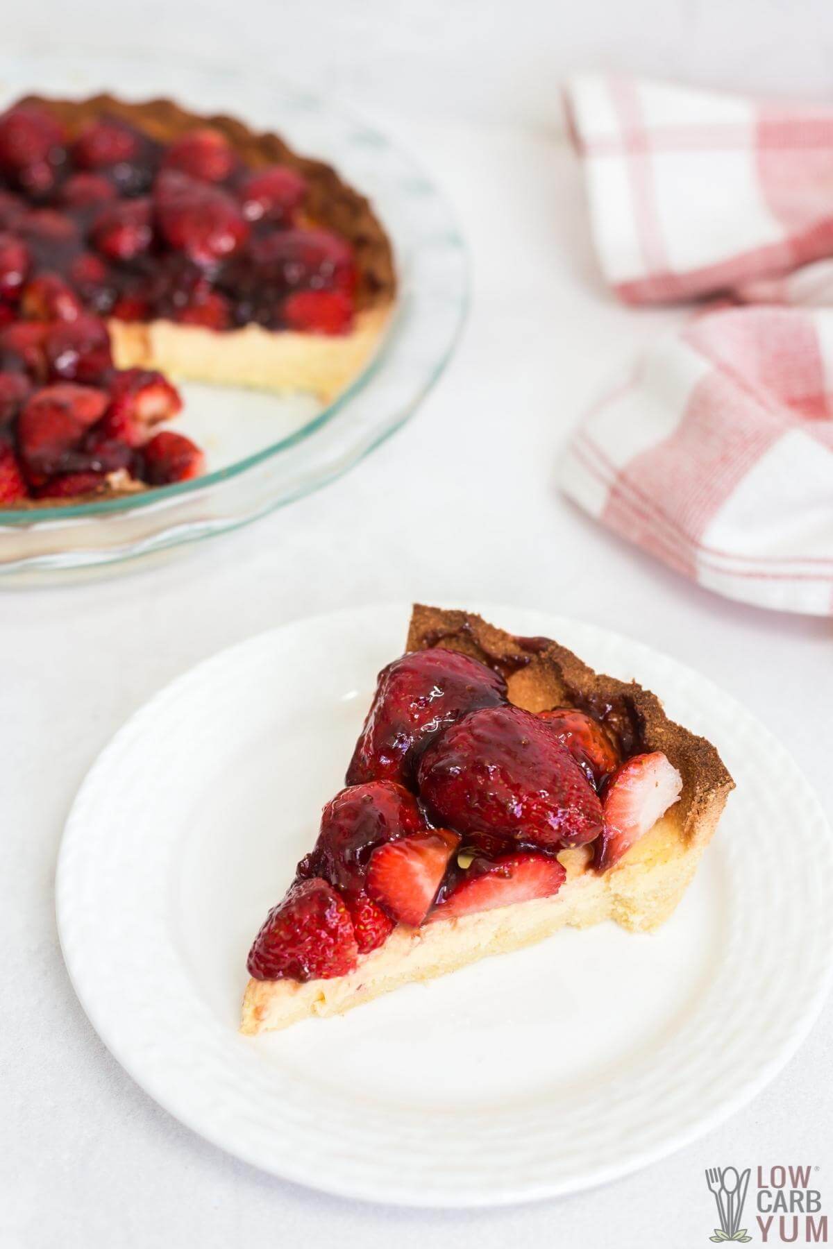 slice of strawberry cheese pie on white plate